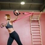 woman exercising with resistance band