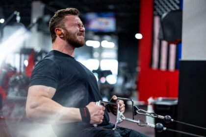 athlete performing a single-arm cable row